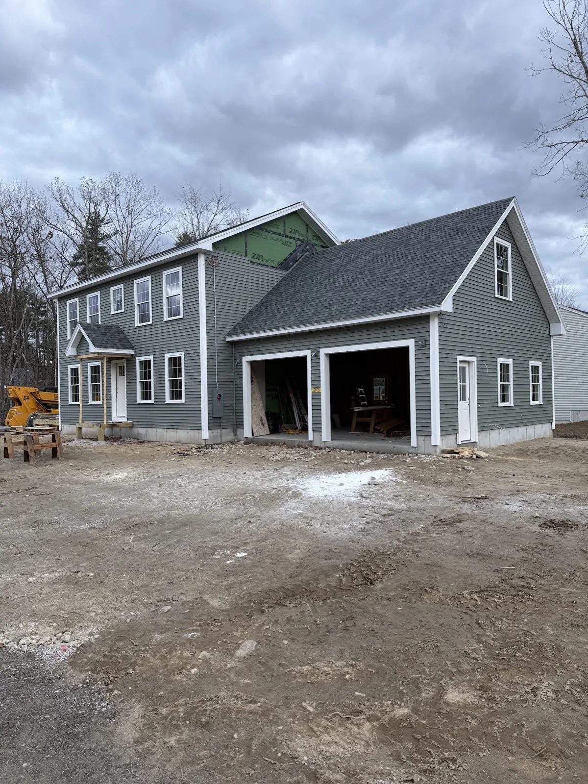Custom colonial home with attached garage built in Biddeford, Maine