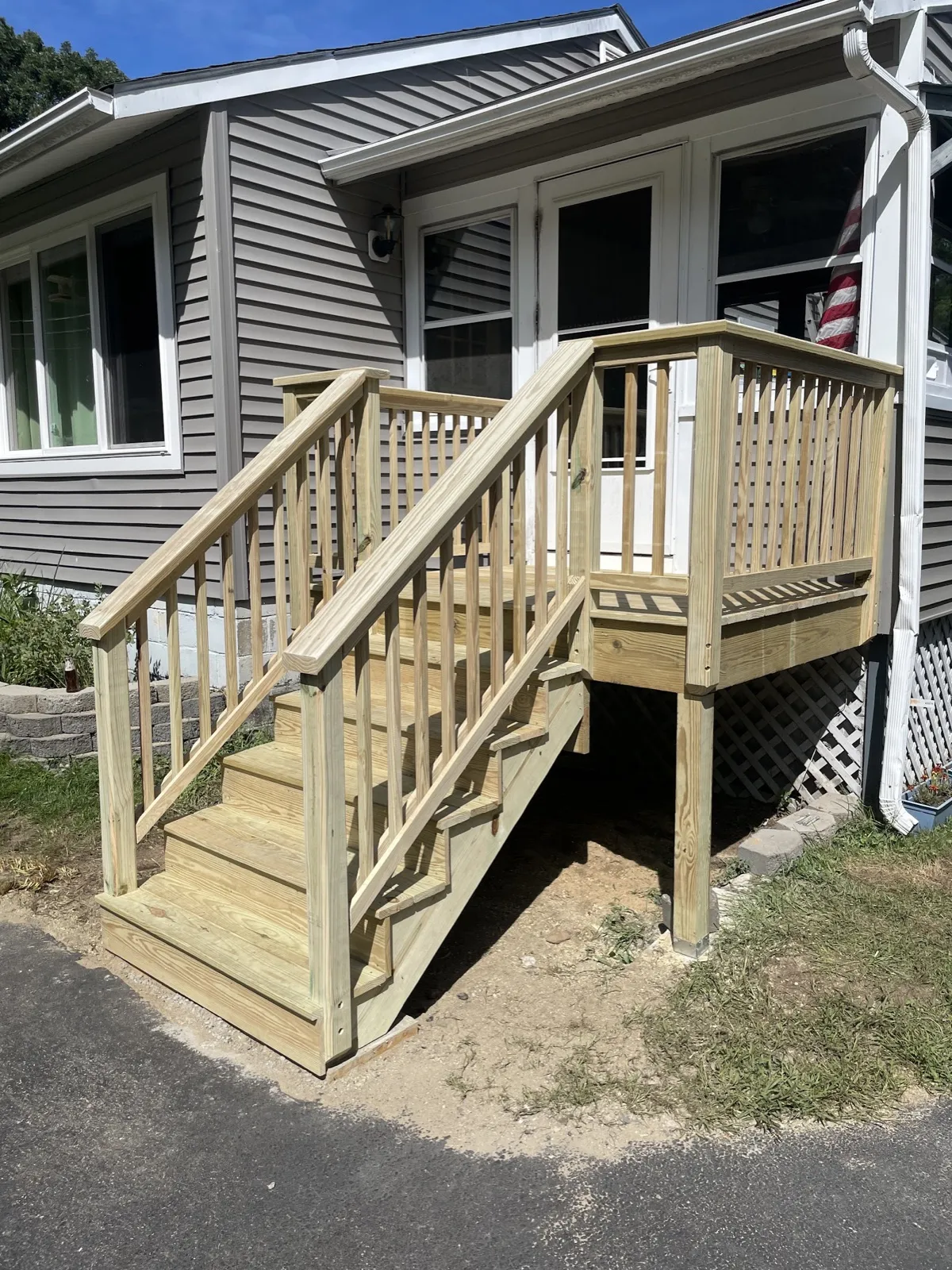 Rebuilt entry deck at a home in Arundel, Maine