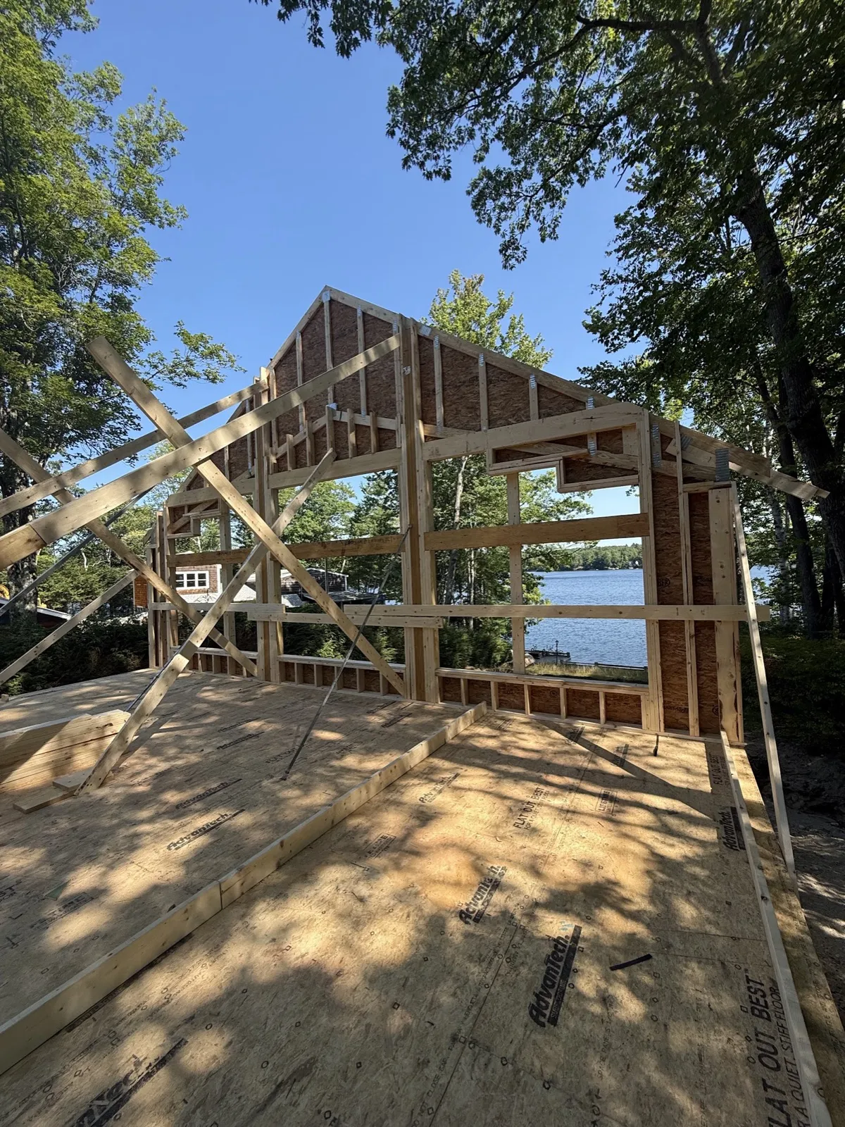 Framed 20-foot gable wall stood up on a new home build in Lyman, Maine