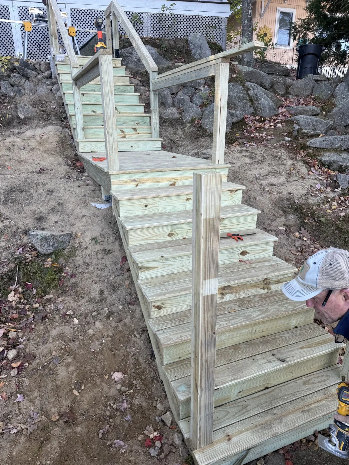 Rebuilt walkway stairs down to the lake in Lyman, Maine