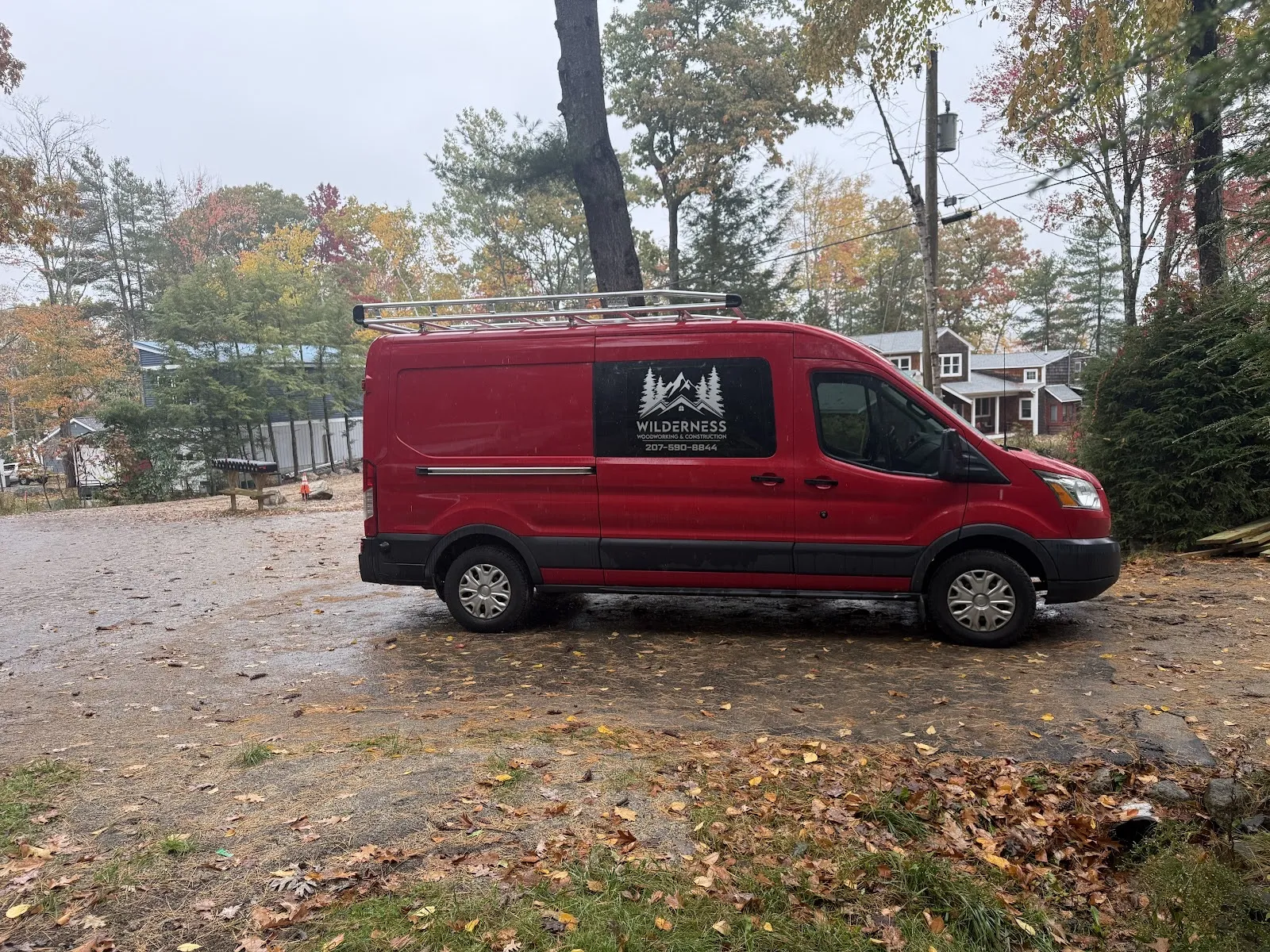Wilderness Woodworking & Construction lettering on the company van